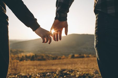 couple holding hands