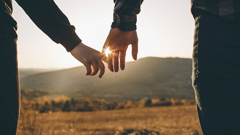 couple holding hands