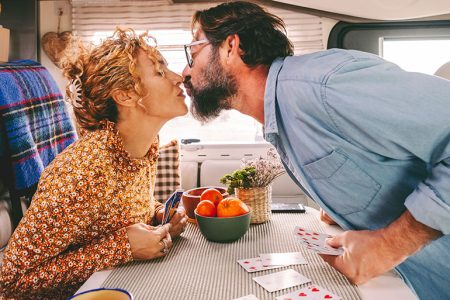 happy couple playing cards photo